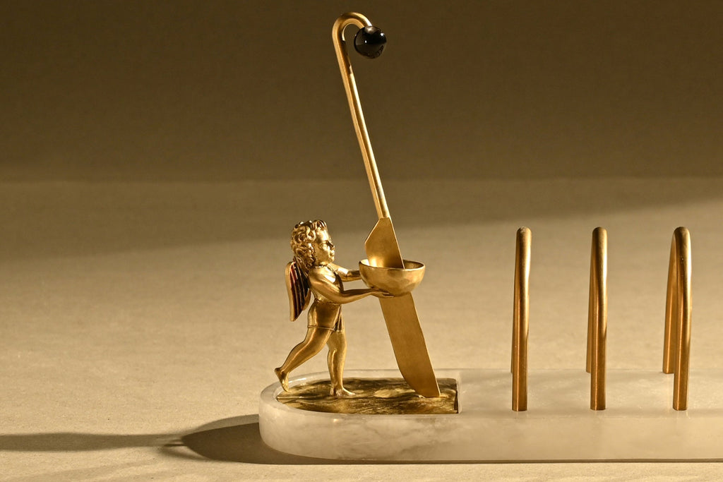 Elysium Breakfast Board detail — cherub and brass hardware by Ira Udaipur